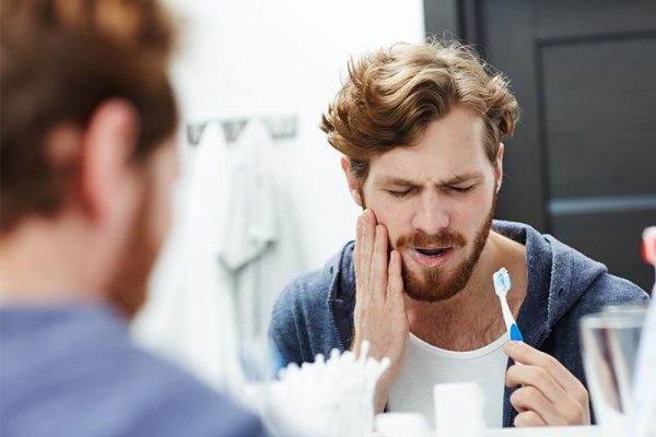 Man with tooth pain