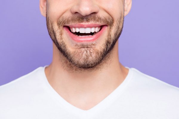 Man with white teeth smiling
