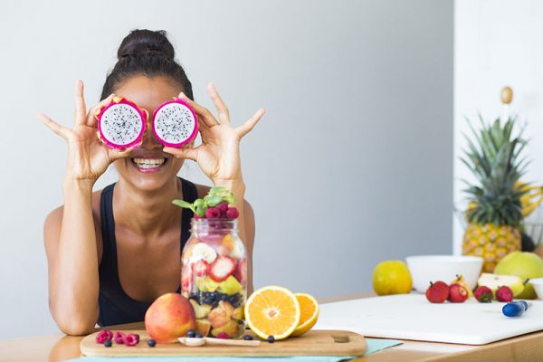 Lady with healthy fruit